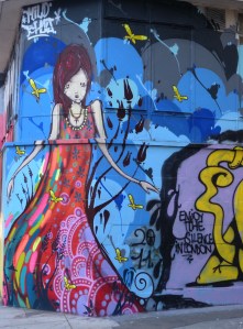 Christina Street - art on boarded building