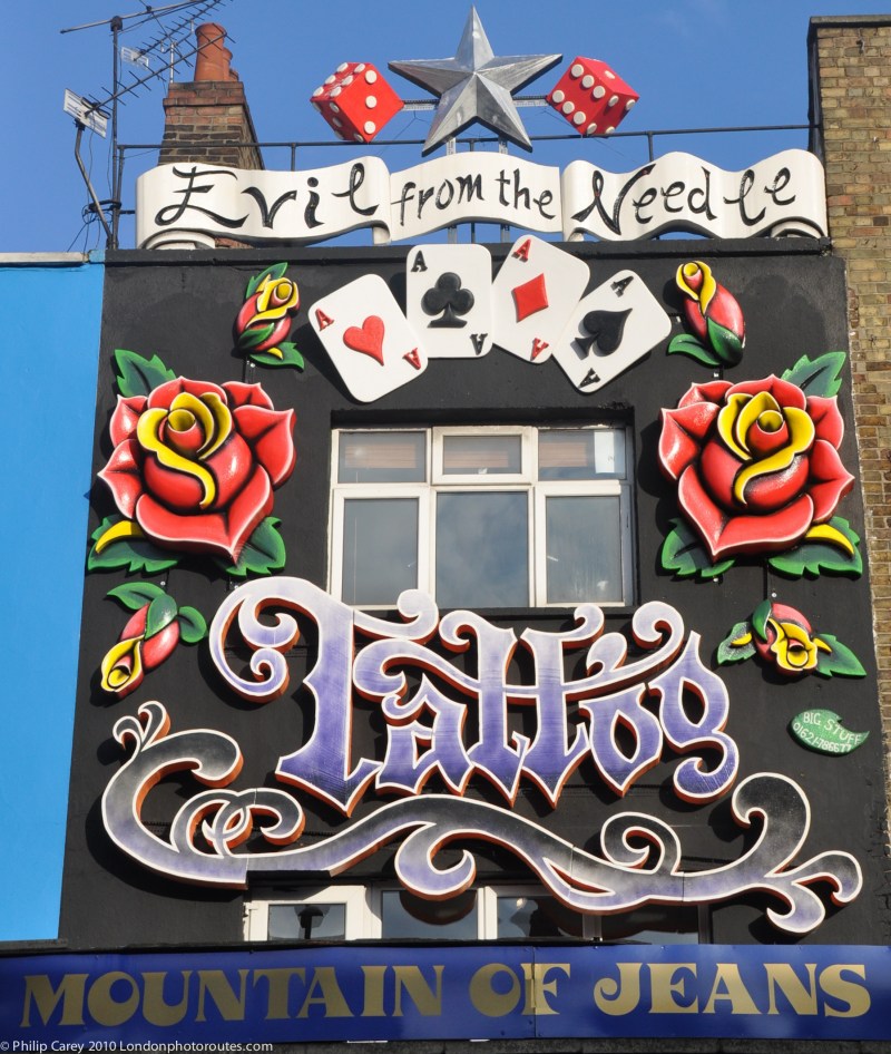 Shopfront art - Camden High Street - Mountain of Jeans