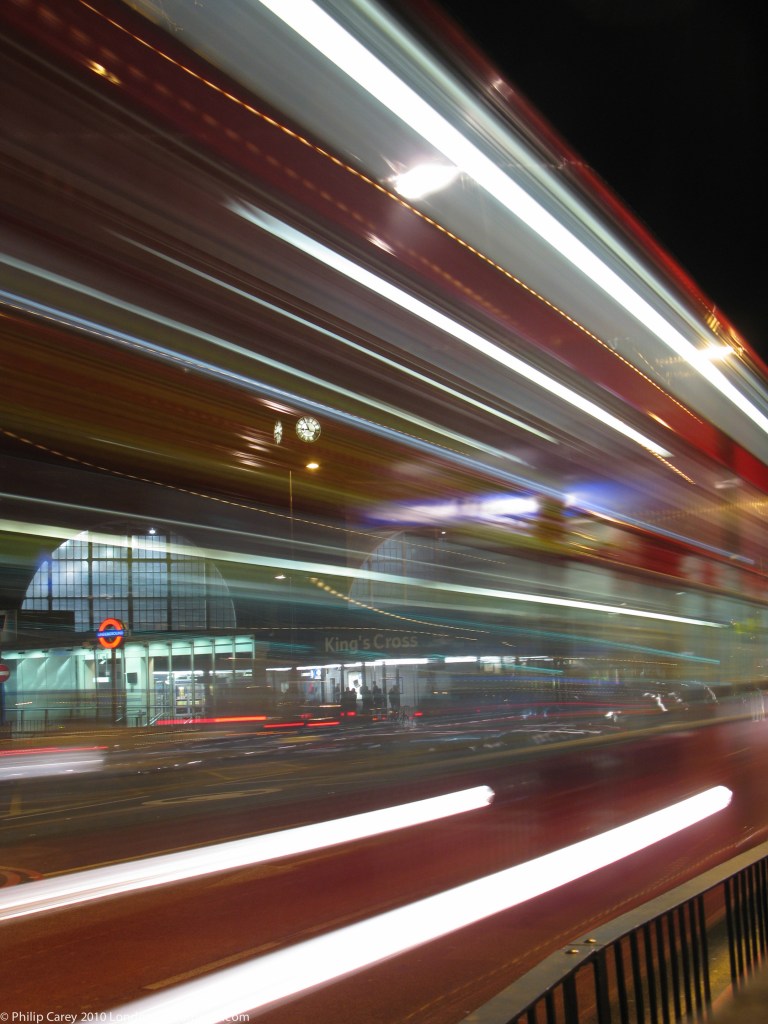 MOVING - Bus going passed Kings Cross Station
