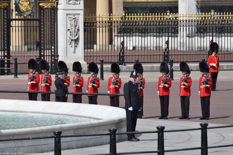 Police and Guards by Queen Victoria's memorial - Trooping of the Colour.