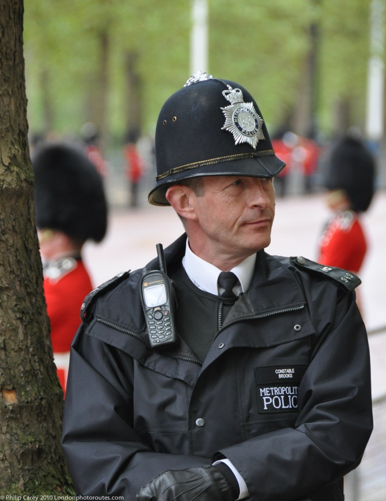 Portrait of an Offices watching the crowds